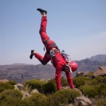 Gavin doing a handstand on the Bell, Cathedral Peak area of the Drakensberg