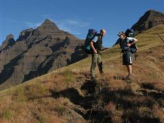 Hikers with Cathedral Peak in the background