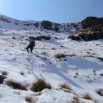Dawie on slope approaching climb